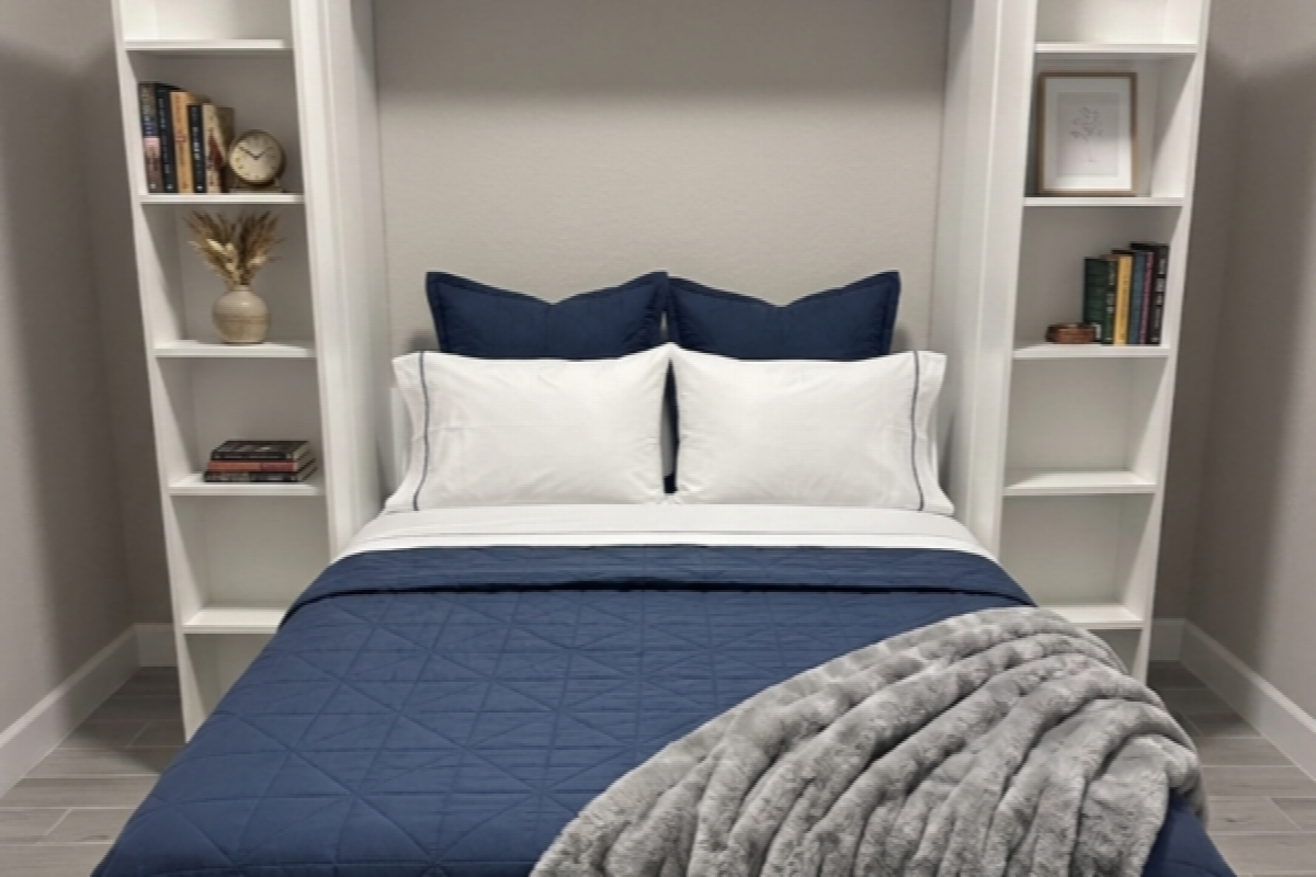 Madison Bifold Bookcase Murphy bed in white finish with crown molding and flanking open bookcase towers, shown in open queen position